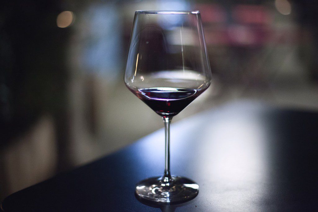 natural aphrodisiac glass of red wine on table