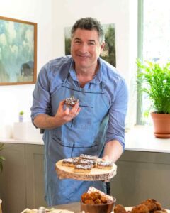 Oliver McCabe Eating Recipe From Kids Kitchen Takeover Cookbook