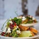 Spinach Guacamole with Feta, Pomegranate & Olive Crumble