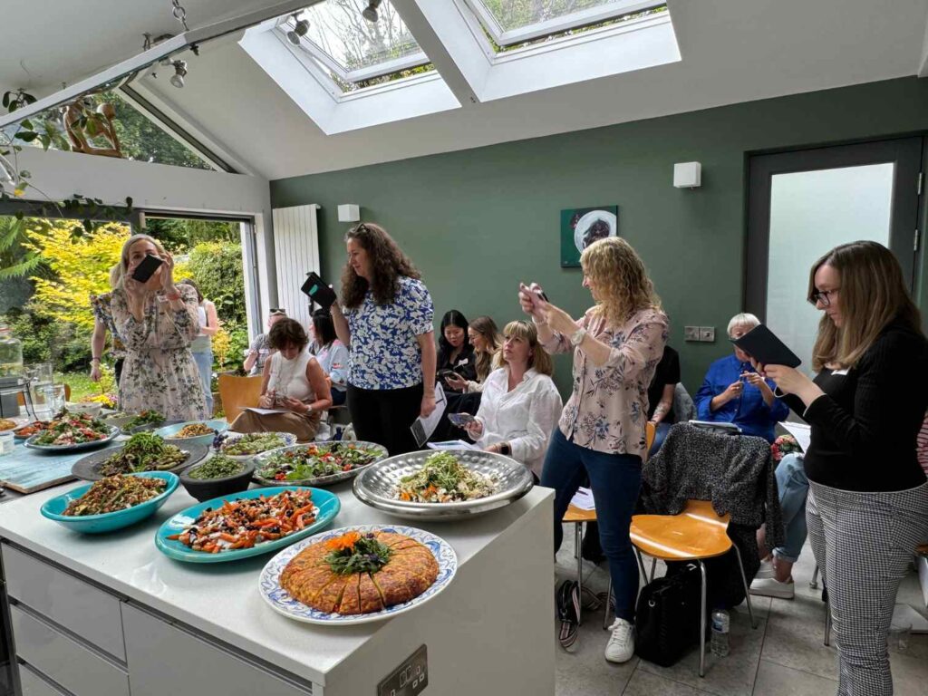Students Photographing Food During Cooking Class