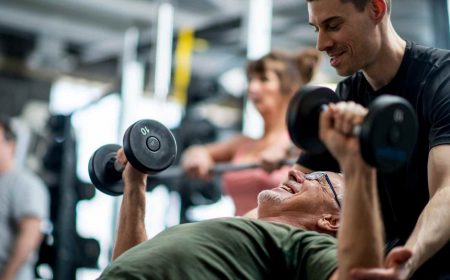 Personal Trainer Coaching Older Man